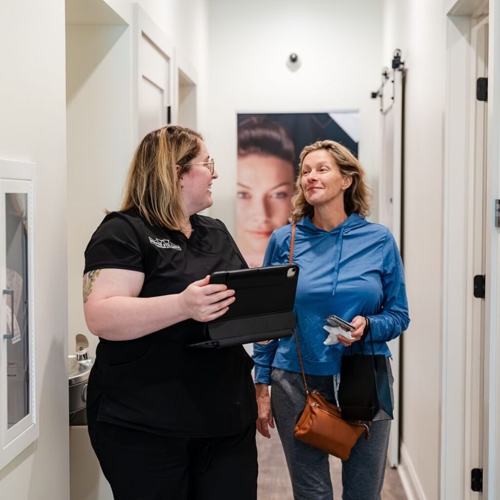 optometrist and patient discussing results